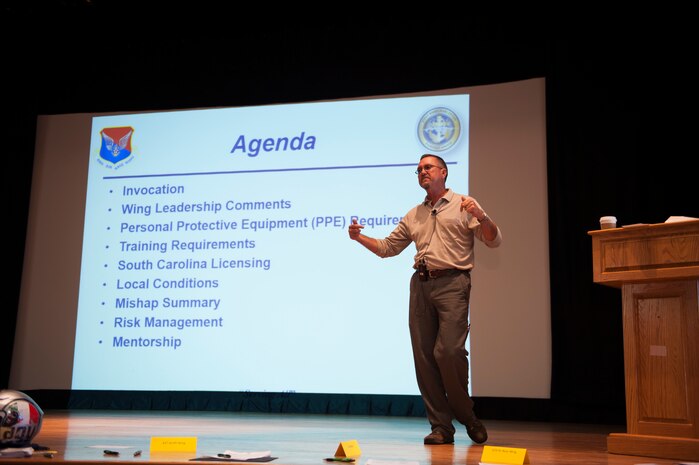 James McMurry, 628th ABW traffic safety manager, discusses motorcycle safety with more than 200 service members, dependents and civilians during the annual Motorcycle Safety Day, April 29, 2016, at Joint Base Charleston, S.C. The annual briefing is required by AFI 91-207, for all active duty Air Force motorcyclists. (U.S. Air Force photo/Staff Sgt. Jared Trimarchi) 
