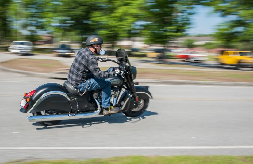 A motorcyclist drives off during the annual Motorcycle Safety Day, April 29, 2016, at Joint Base Charleston, S.C. The annual briefing is required by AFI 91-207, for all active duty Air Force motorcyclists. More than 200 service members, dependents and civilians attended. (U.S. Air Force photo/Staff Sgt. Jared Trimarchi) 