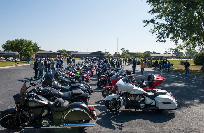 More than 200 service members, dependents and civilians gather around motorcycles during the annual Motorcycle Safety Day, April 29, 2016, at Joint Base Charleston, S.C. The annual briefing is required by AFI 91-207, for all active duty Air Force motorcyclists. (U.S. Air Force photo/Staff Sgt. Jared Trimarchi) 