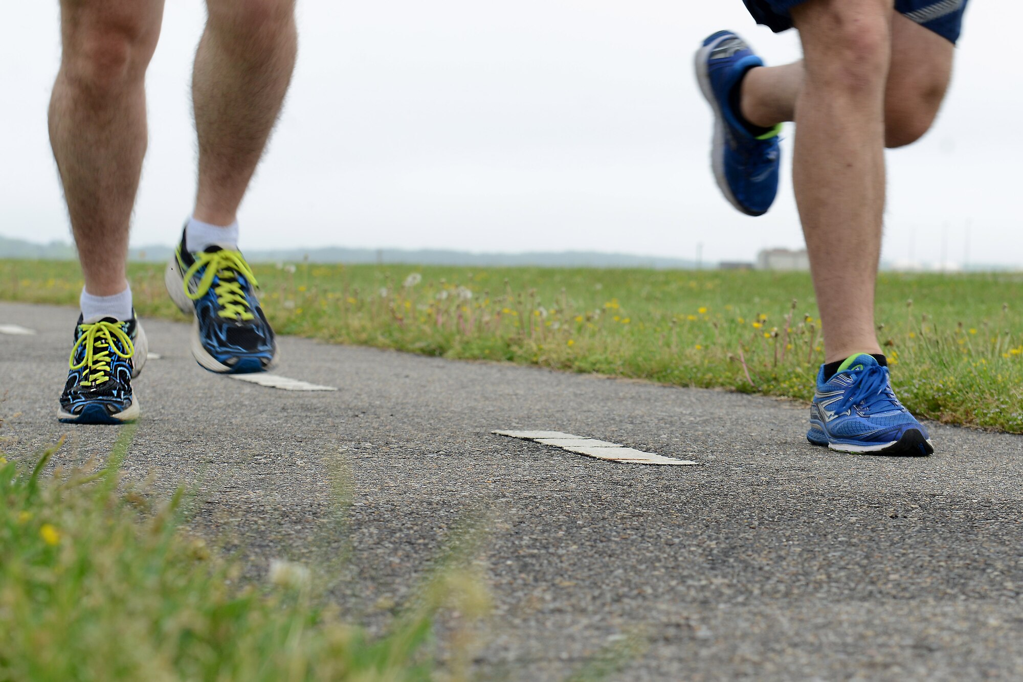 Airmen from the 83rd Network Operations Squadron sprint toward the halfway point of the annual Major Ransom Memorial 5K run at Langley Air Force Base, Va., April 28, 2016. The memorial run is hosted by the 83rd NOS each year to honor nine Airmen who were killed in Afghanistan in April 2011. (U.S. Air Force photo by Staff Sgt. Teresa J. Cleveland)