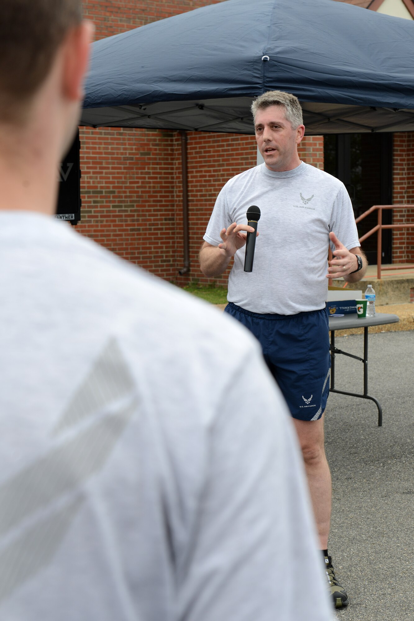U.S. Air Force Lt. Col. James Lotspeich, commander of the 83rd Network Operations Squadron, speaks to Airmen before the annual Major Ransom Memorial 5k run at Langley Air Force Base, Virginia, April 28, 2016. Ransom died April 27, 2011, at the Kabul International Airport, Afghanistan, of wounds suffered from gunfire. (U.S. Air Force photo by Staff Sgt. Teresa J.  Cleveland)