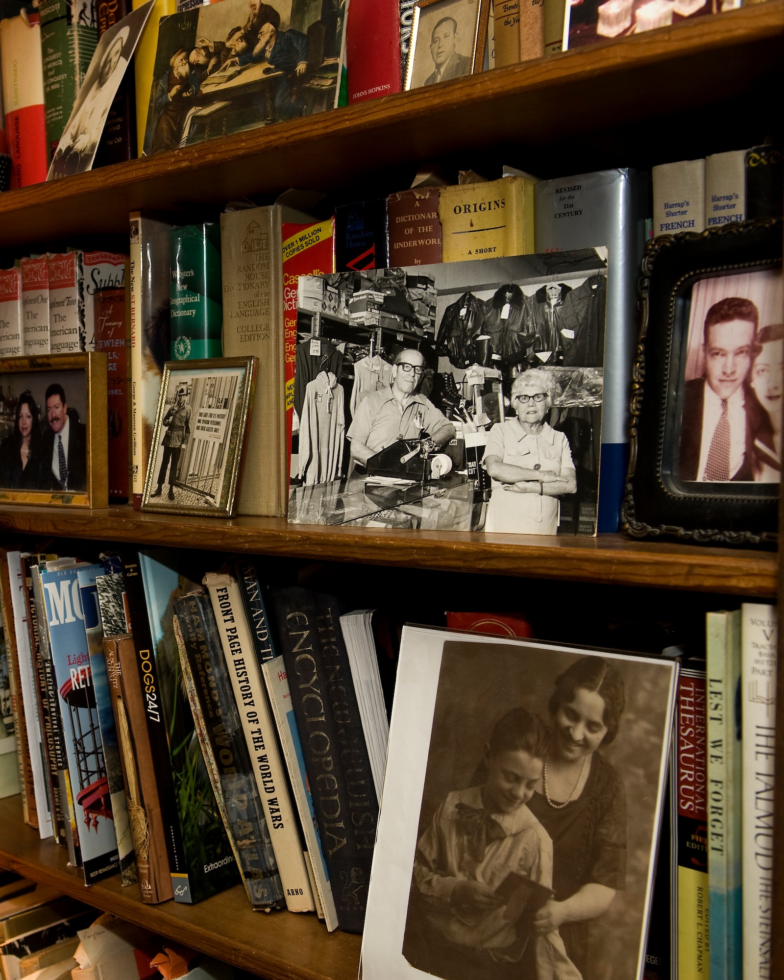 A collection of old photographs sits on the shelves in the home of Kitty Saks, a Holocaust survivor, in Norfolk, Va., April 29, 2016. During the Holocaust, Saks lost 27 members of her family, including her grandparents. (U.S. Air Force photo by Airman 1st Class Kaylee Dubois)