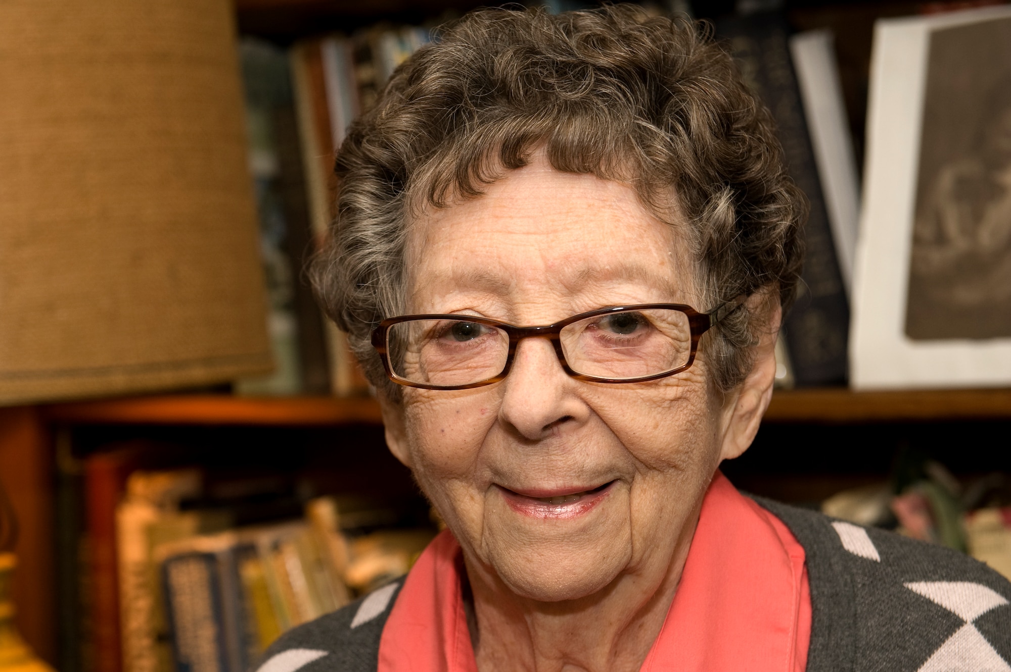 Kitty Saks, a Holocaust survivor, shared her experience as a hidden child survivor during the Holocaust at a Remembrance Ceremony at Langley Air Force Base, Va., April 29, 2016. Saks survived by hiding in a convent under the pseudonym Rosette Nizolle during the Nazi persecution of Jewish citizens. (U.S. Air Force photo by Airman 1st Class Kaylee Dubois)
