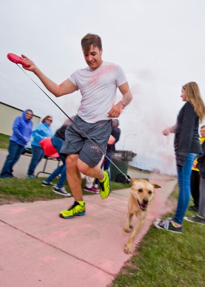The 5th Medical Group and Health and Wellness Center hosted its third annual 5k/10k Meltdown Color Fun Run on Minot Air Force Base, N.D., April 27, 2016. Approximately 175 runners participated in the event which was held to raise awareness for sexual assault, alcohol awareness and child abuse prevention. Color run T-shirt sales raised over $300 which will be used to support the Sexual Assault Prevention and Response program, Alcohol and Drug Abuse Prevention and Treatment program and the Family Advocacy Program. (U.S. Air Force photo/Airman 1st Class J.T. Armstrong