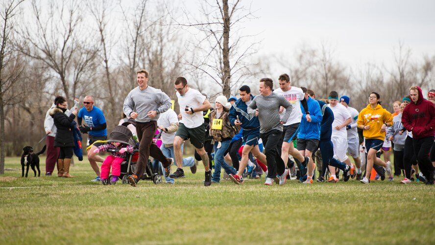 The 5th Medical Group and Health and Wellness Center hosted its third annual 5k/10k Meltdown Color Fun Run on Minot Air Force Base, N.D., April 27, 2016. Approximately 175 runners participated in the event which was held to raise awareness for sexual assault, alcohol awareness and child abuse prevention. Color run T-shirt sales raised over $300 which will be used to support the Sexual Assault Prevention and Response program, Alcohol and Drug Abuse Prevention and Treatment program and the Family Advocacy Program. (U.S. Air Force photo/Airman 1st Class J.T. Armstrong