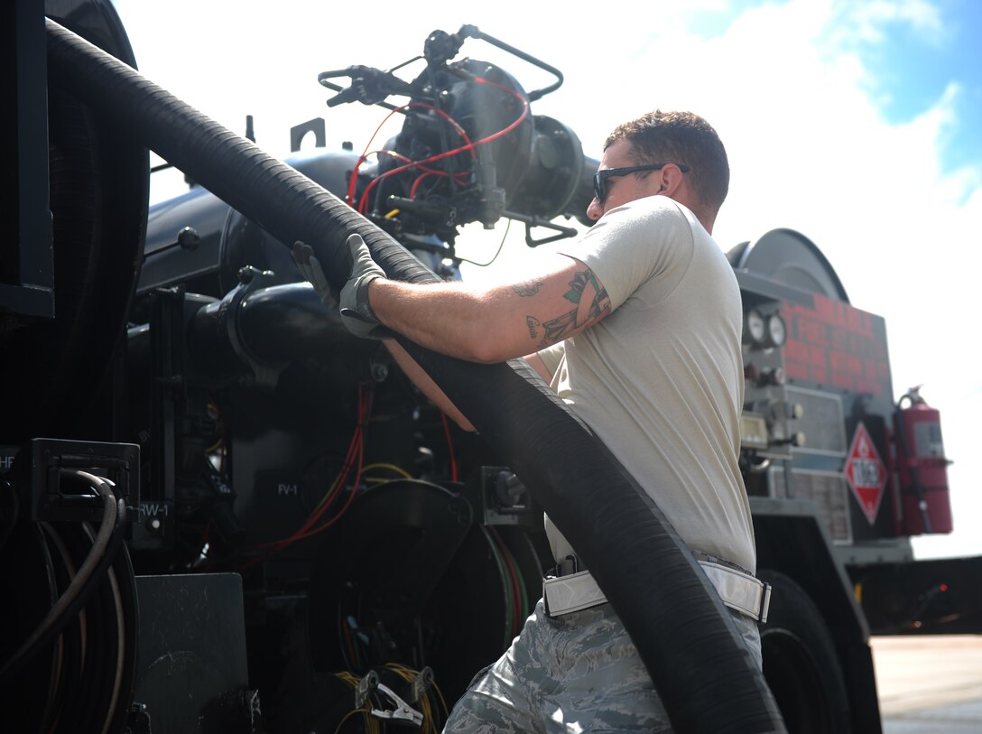 U.S. Air Force Senior Airman Connor Mortellaro, 7th Logistics Readiness Squadron fuels distribution operator, connects a refueling unit to a fuels hydrant outlet on the flightline April 21, 2016, at Dyess Air Force Base, Texas. In 2015, the fuels management flight of Dyess provided aircraft with more than 25.3 million gallons of fuel. (U.S. Air Force photo by Airman 1st Class Rebecca Van Syoc/Released)