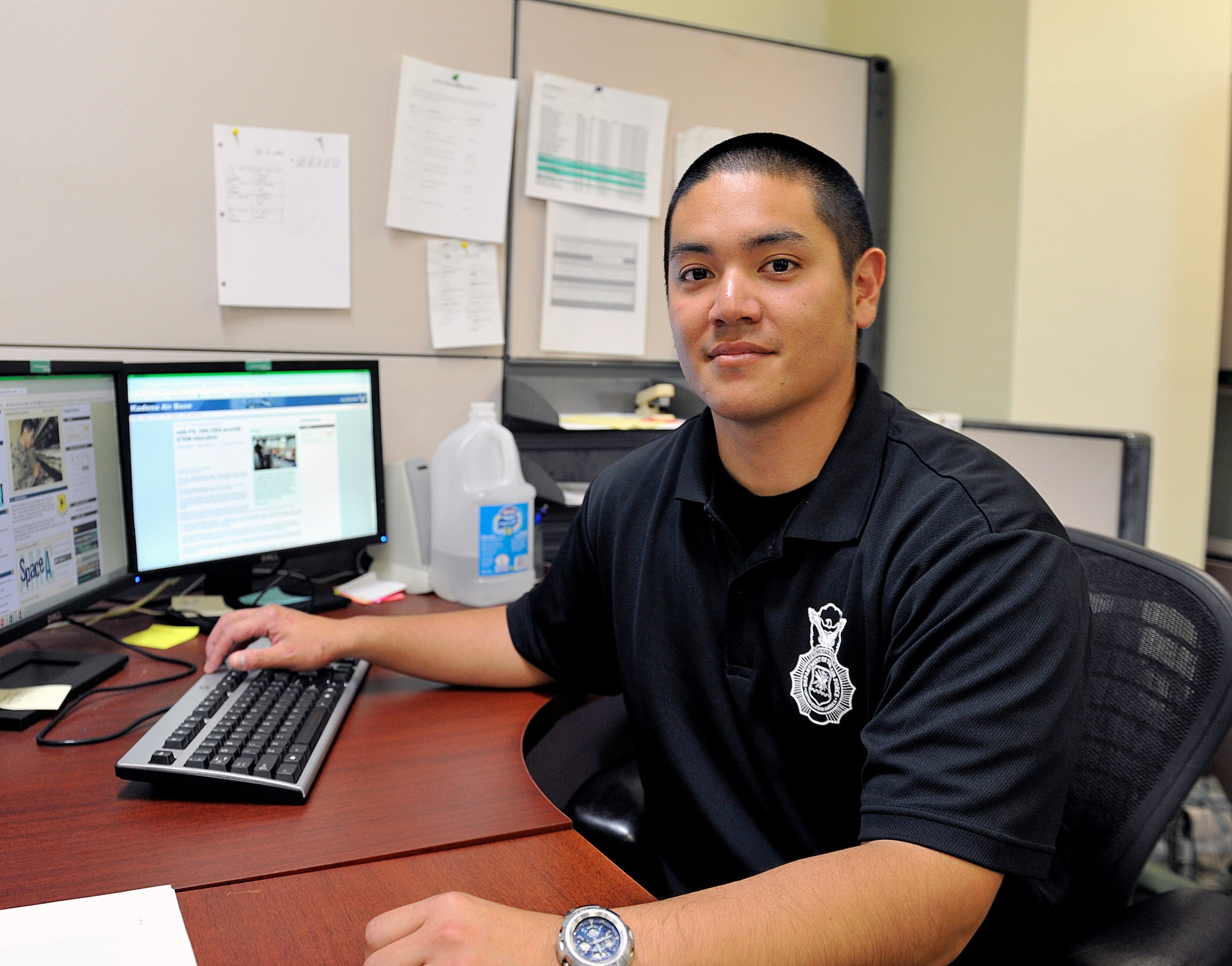 Yoshikazu Isa, 18th Security Forces Squadron master labor contractor training instructor, has been working at the 18th SFS for more than 16 years. Isa has worked as a guard before and moved to his current position over three years ago. As a training instructor, Isa conducts training courses for new guards. (U.S. Air Force photo by Naoto Anazawa)