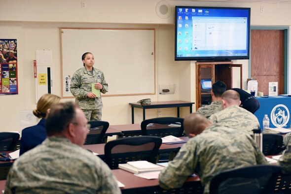 Senior Airman Akia Carter, 30th Logistics Readiness Squadron personal property counselor, briefs departing personnel on upcoming move, April 29, 2016, Vandenberg Air Force Base, Calif. The traffic management office provides a variety of tips to ensure military permanent change of duty station movement is executed with care and precision. (U.S. Air Force photo by Staff Sgt. Jim Araos/Released)