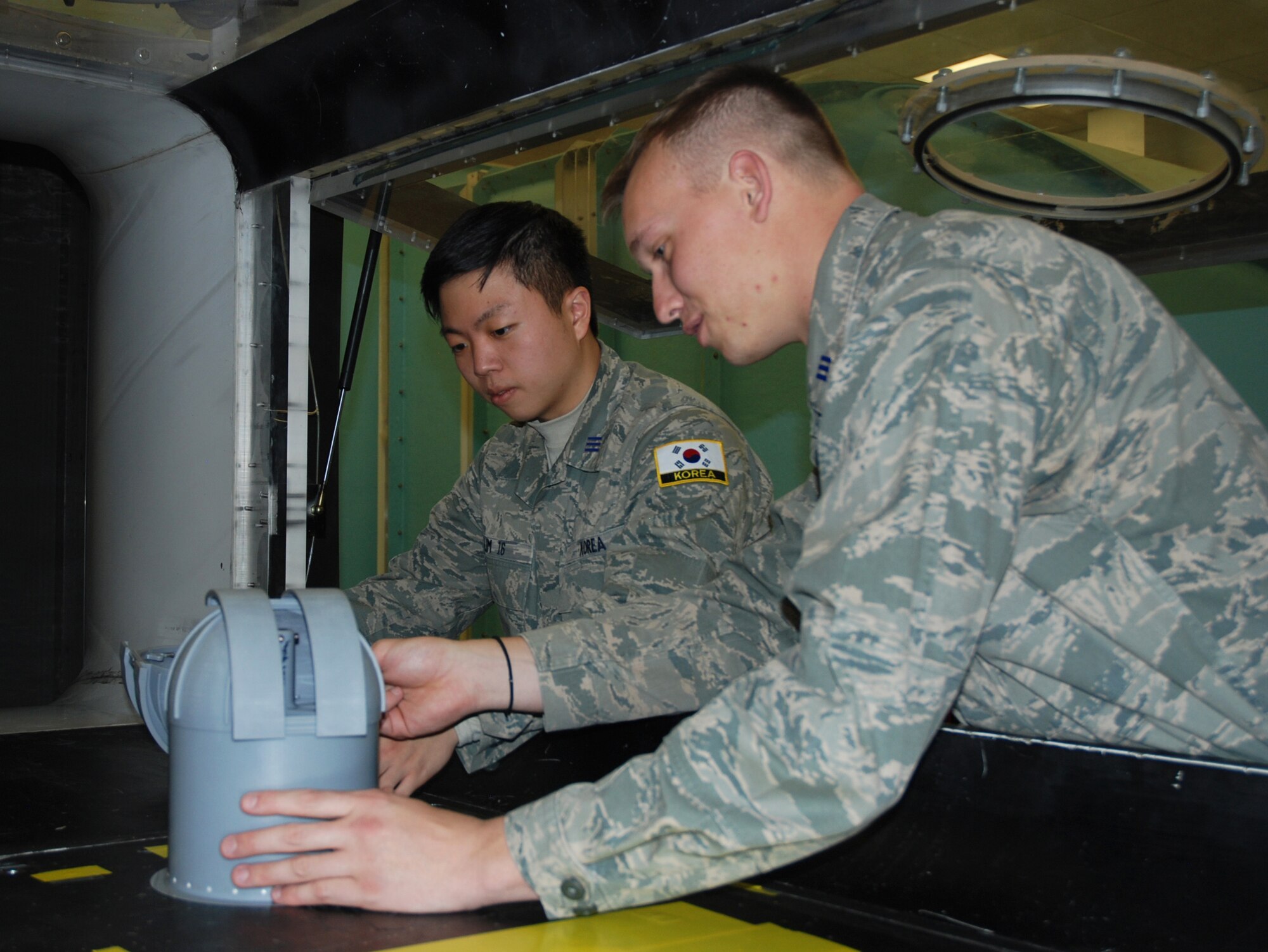 UNITED STATES AIR FORCE ACADEMY. Colo. – U.S. Air Force Academy Cadets First Class Randy Frost and Sangmin Lim, Aeronautics majors at the U.S. Air Force Academy, conducted research for the 21st Operations Group and Air Force Space Command’s Space and Missile Center’s Space Superiority Division. Their work provided valuable, cost effective information about wind impact on domes housing Ground-based Electro-Optical Deep Space Surveillance Systems that may help increase mission capabilities. (U.S. Air Force Photo by Dave Smith)