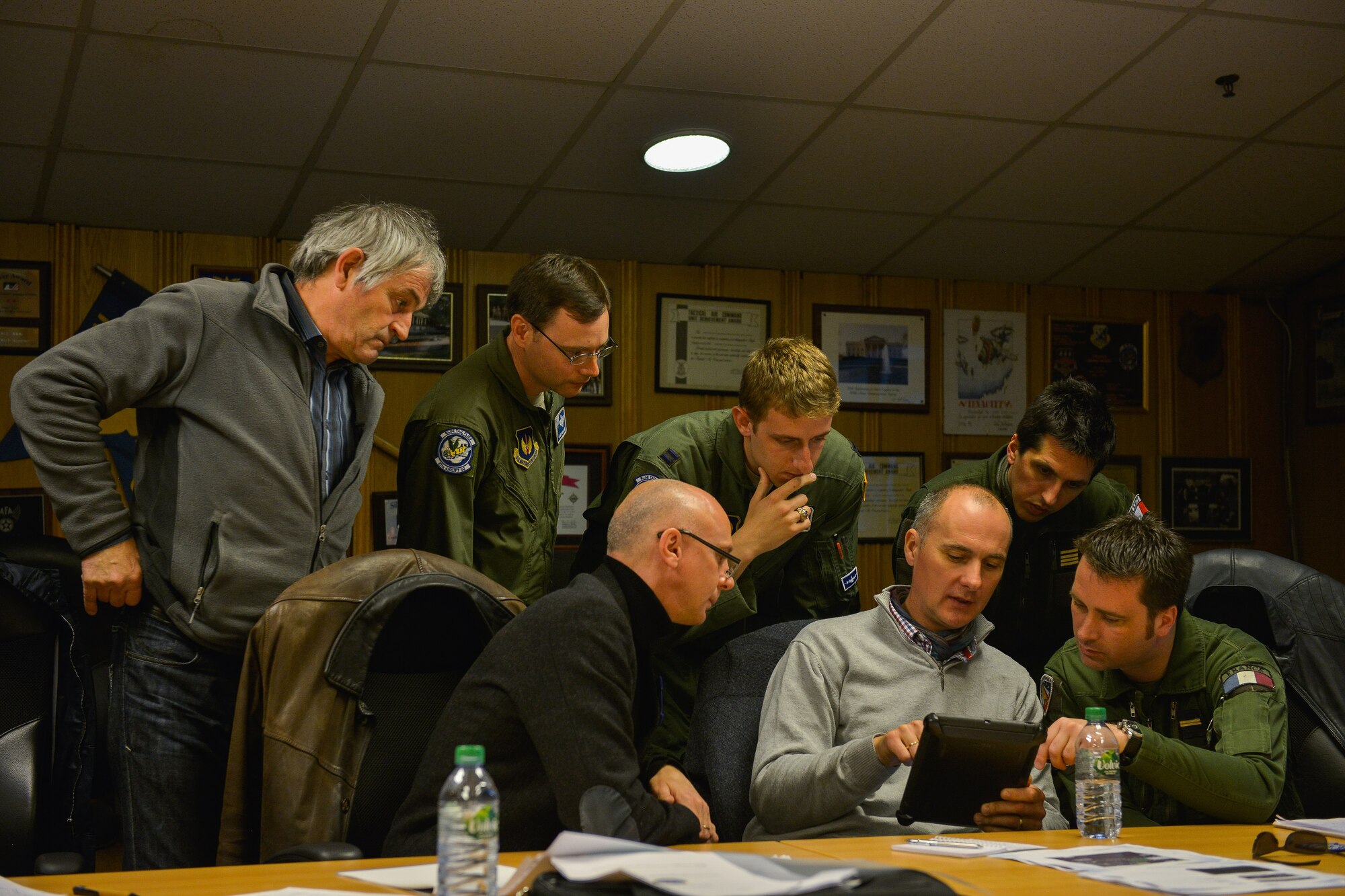 U.S. and French Airmen review the capabilities of a C-130J Super  Hercules aircraft during a meeting April 28, 2016, at Ramstein Air Base. Members of the 37th Airlift Squadron demonstrated to their French counterparts the functions of the aircraft. (U.S. Air Force Photo/ Airman 1st Class Lane Plummer) 