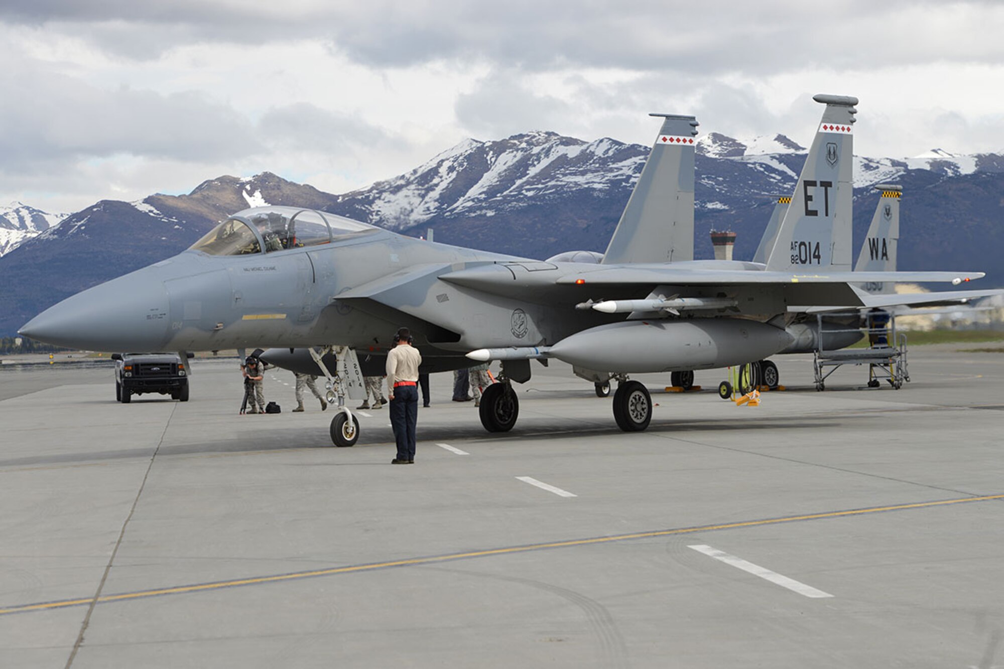 Senior Airman Oscar Mares, 96th Aircraft Maintenance Squadron F-15 crew chief, salutes an F-15 Eagle pilot as he taxis for departure on the Joint Base Elmendorf-Richardson flightline, May 3, 2016. Mares is deployed to JBER as part of Red Flag-Alaska, a Pacific Air Forces commander-directed field training exercises for U.S. and international forces, providing combined offensive counter-air, interdiction, close air support and large force employment training in a simulated combat environment. (U.S. Air Force photo by Airman 1st Class Javier Alvarez)