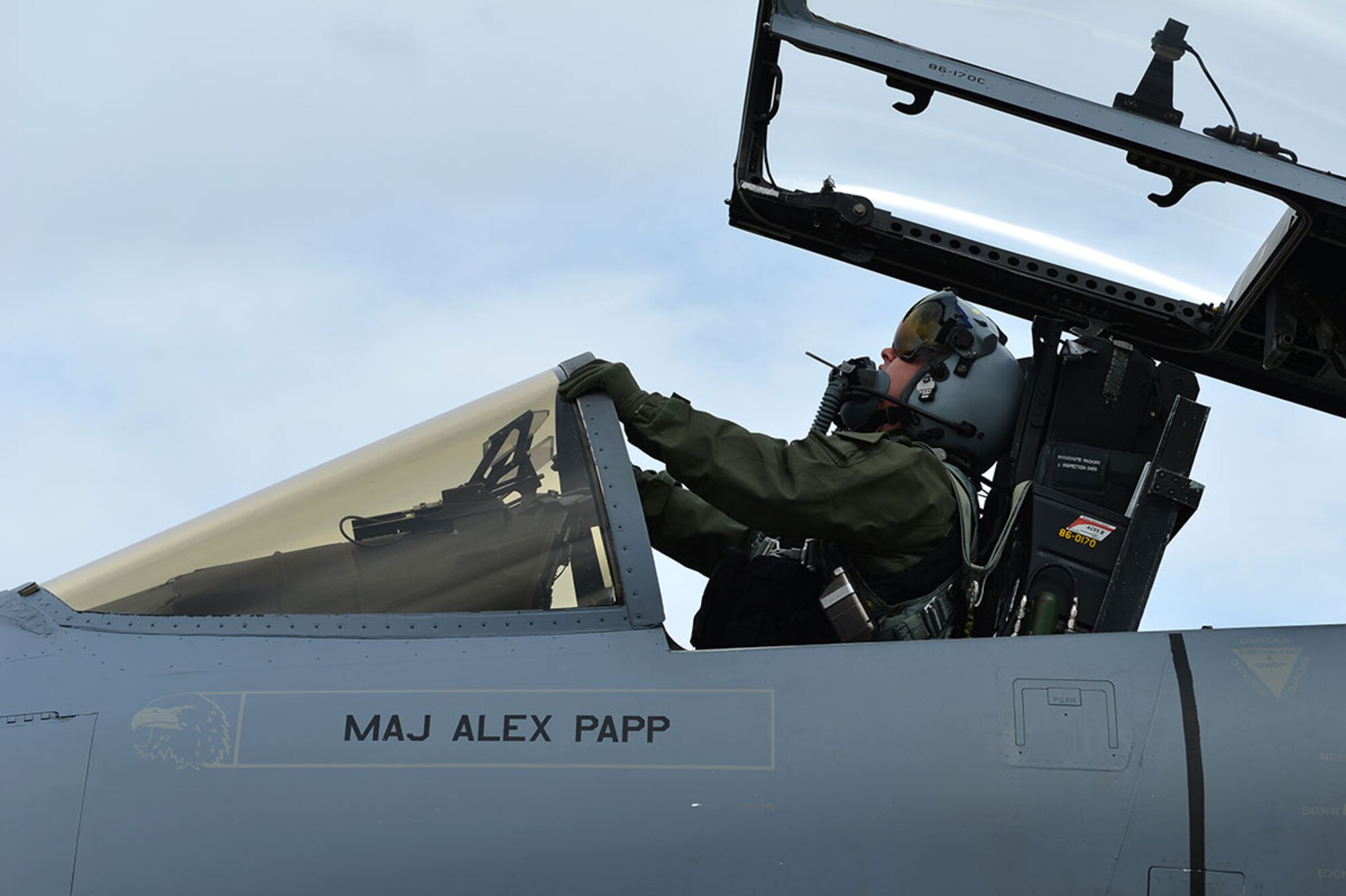 An Air Force F-15 Eagle pilot from Eglin Air Force Base, Fla., stretches as he settles into the cockpit on the Joint Base Elmendorf-Richardson flightline during RED FLAG-Alaska 16-1. RF-Alaska is a Pacific Air Forces commander-directed field training exercise for U.S. and international forces, which provides joint offensive counter-air, interdiction, close air support, and large-force employment training in a simulated combat environment. (U.S. Air Force photo by Airman 1st Class Kyle Johnson)