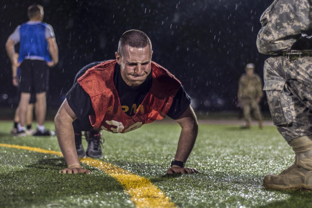 Soldiers begin the Army's physical fitness test in the rain during the 2016 U.S. Army Reserve Best Warrior Competition at Fort Bragg, N.C., May 3, 2016. This year’s event determined which noncommissioned officer and junior enlisted soldier would represent the Army Reserve in the Army's Best Warrior Competition later this year. Army photo Sgt. 1st Class Brian Hamilton