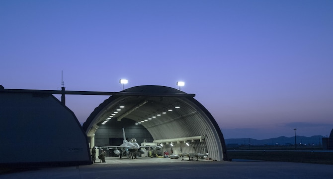 Airmen from the 35th Aircraft Maintenance Unit perform preflight checks on an F-16 Fighting Falcon during Beverly Midnight 16-3 at Kunsan Air Base, Republic of Korea, May 4, 2016. The exercise accentuated the importance of maintaining heightened readiness and aircraft alert levels to ensure security on the Korean peninsula. (U.S. Air Force photo by Staff Sgt. Nick Wilson/Released)