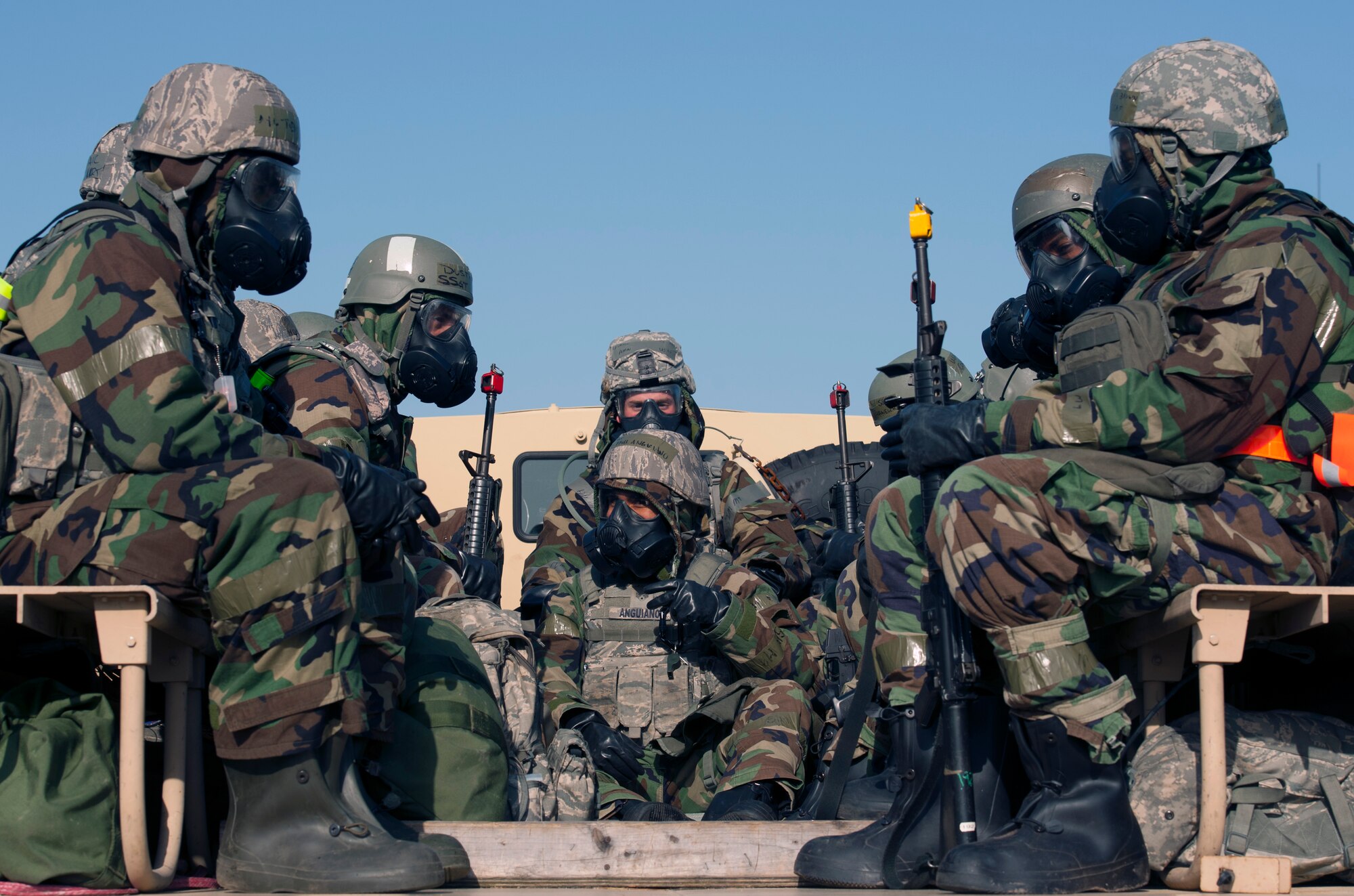 Augmentees and response force Airmen from the 8th Security Forces Squadron prepare for a shift change after working long shifts during Exercise Beverly Midnight 16-3 at Kunsan Air Base, Republic of Korea, May 4, 2016. The exercise tested Airmen on their ability to survive and operate while under the stress of simulated wartime activities all while ensuring rapid aircraft generation. (U.S. Air Force photo by Staff Sgt. Nick Wilson/Released)