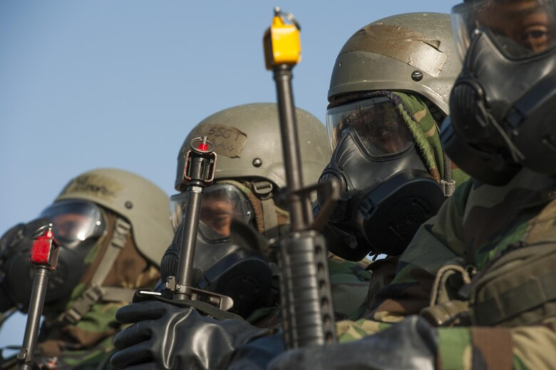 Augmentees and response force Airmen from the 8th Security Forces Squadron prepare for a shift change after working long shifts during Exercise Beverly Midnight 16-3 at Kunsan Air Base, Republic of Korea, May 4, 2016. The exercise tested Airmen on their ability to survive and operate while under the stress of simulated wartime activities. (U.S. Air Force photo by Staff Sgt. Nick Wilson/Released)