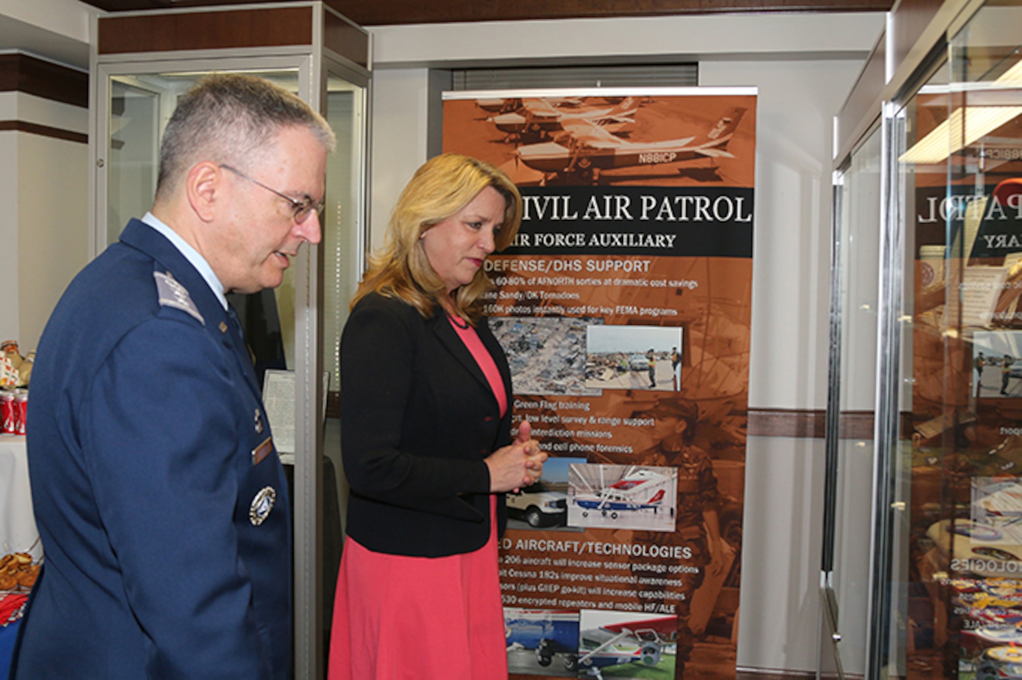 Secretary of the Air Force Deborah Lee James paused at Civil Air Patrol’s History Exhibit to share her thoughts on the value and significance of CAP’s role as a part of the Air Force Total Force. The display, which is housed in the front lobby at National Headquarters, features artifacts from CAP’s 75 years of service.