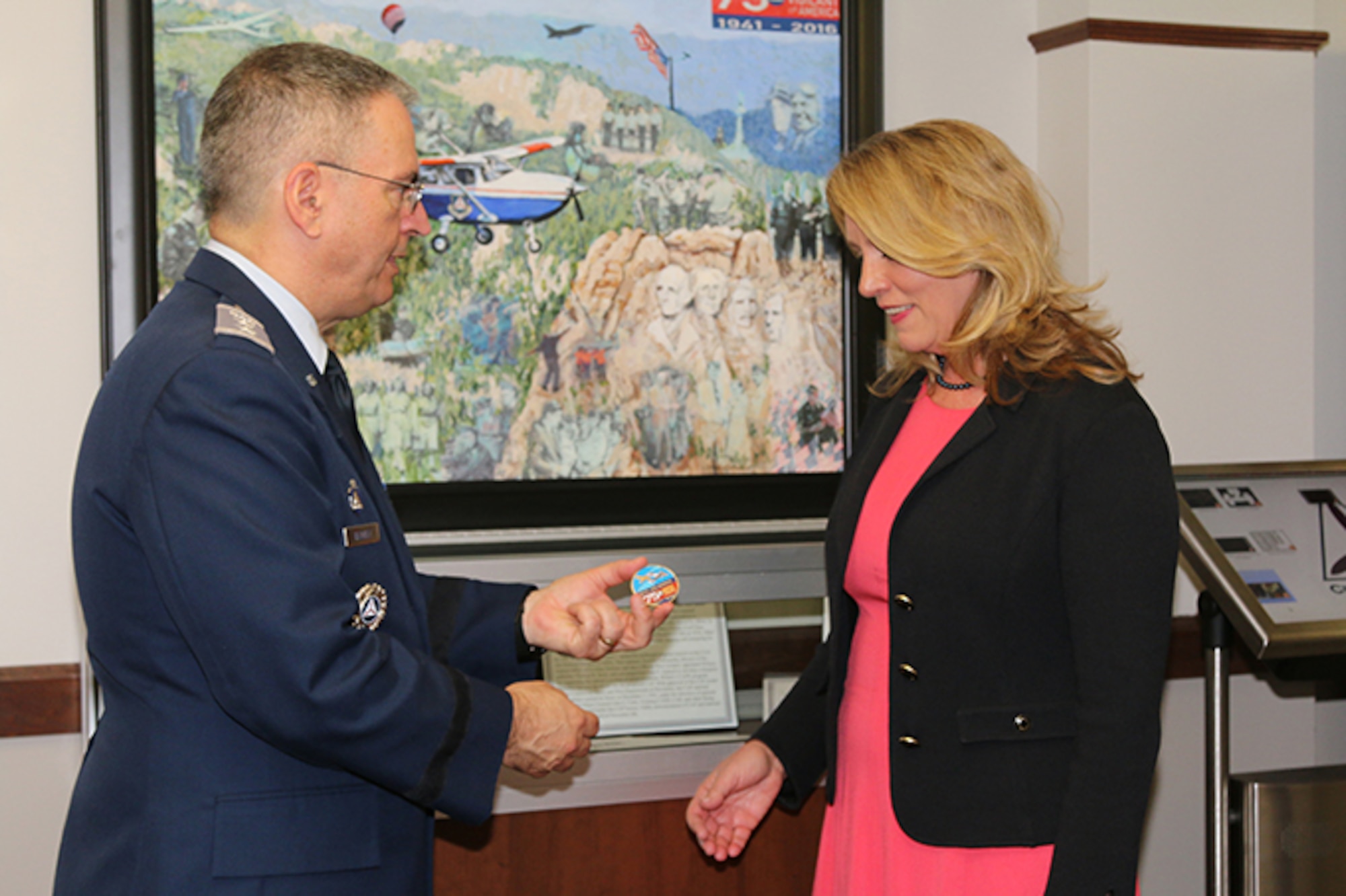 “Welcome to your Air Force Auxiliary,” said Maj. Gen. Joe Vazquez, Civil Air Patrol’s national commander, who presented Secretary of the Air Force Deborah Lee James with the organization’s 75th anniversary coin. More information about CAP’s anniversary can be found at www.CAP75th.com. 