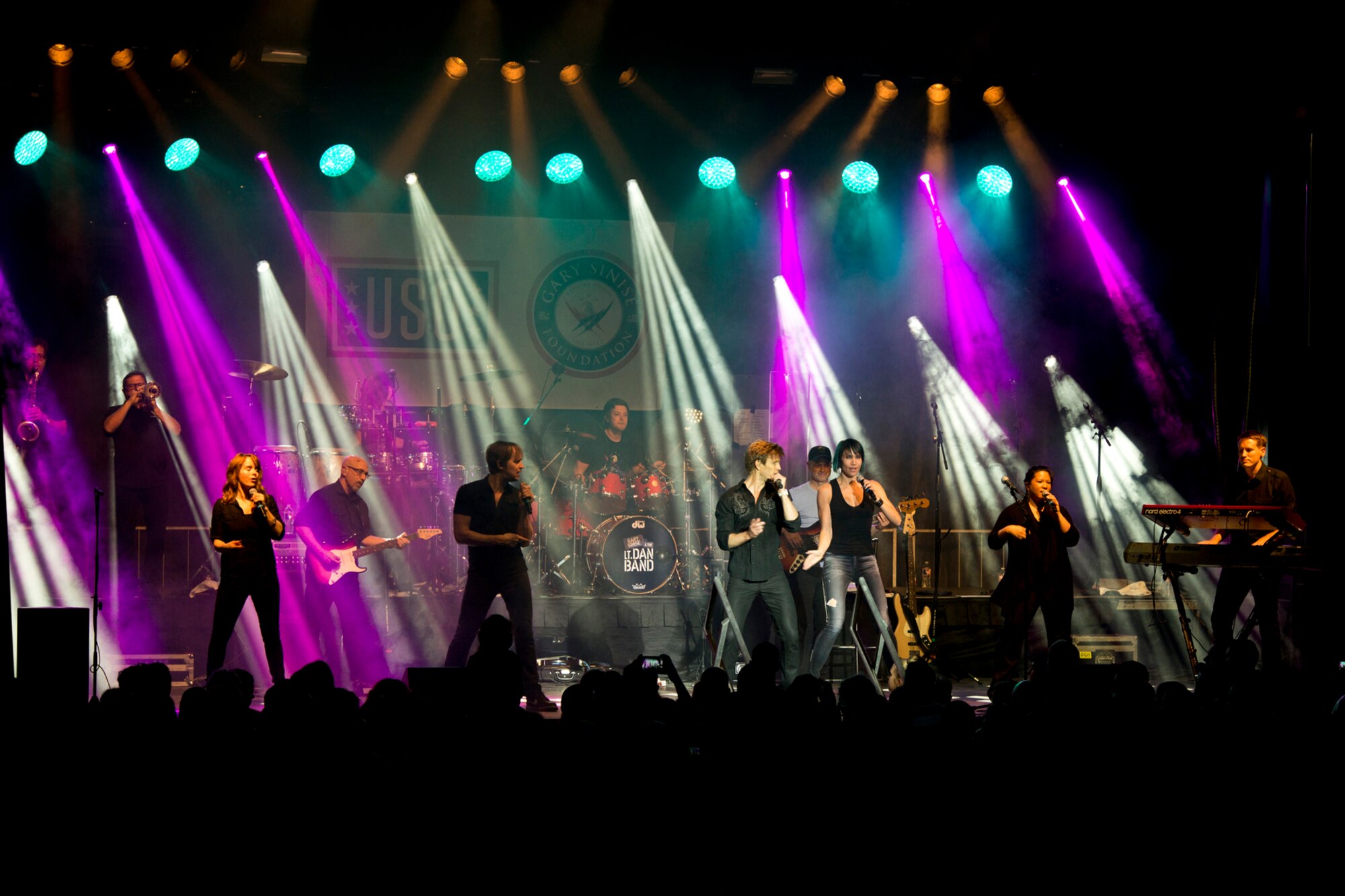 The Lt. Dan Band performs at Little Rock Air Force Base, Ark., April 29, 2016. The band, which performs more than 40 concerts a year for military members and their families, gets its name from the character Gary Sinise portrayed in the Academy-Award winning movie “Forrest Gump.” (U.S. Air Force photo by Master Sgt. Jeff Walston)   