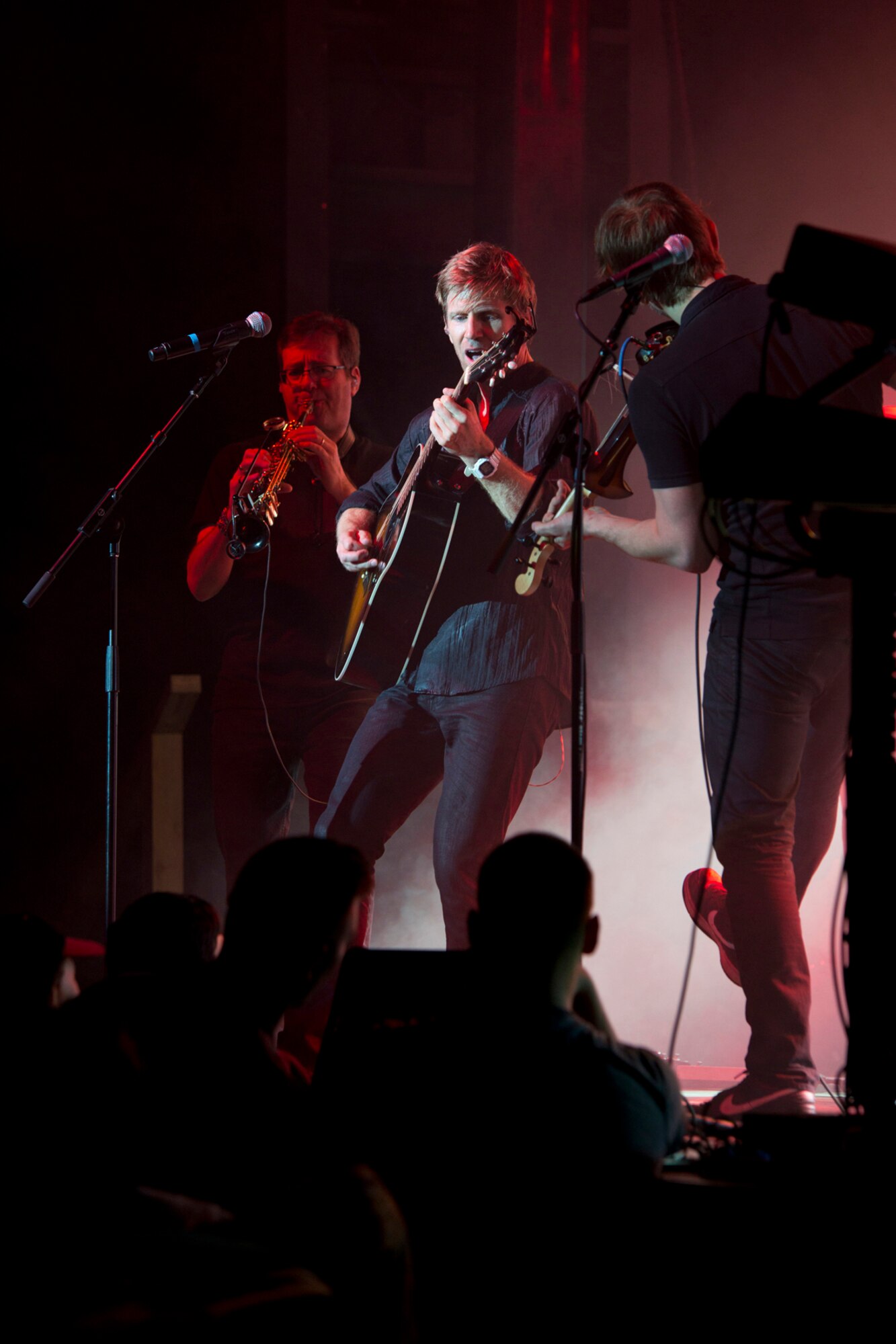 (L-R) Members of The Lt. Dan Band, Mitch Paliga, Jeff Vezain, and Dan Myers, perform during a free concert at Little Rock Air Force Base, Ark., April 29, 2016. The band, which performs more than 40 concerts a year for military members and their families, gets its name from the character Gary Sinise portrayed in the Academy-Award winning movie “Forrest Gump.” (U.S. Air Force photo by Master Sgt. Jeff Walston)   