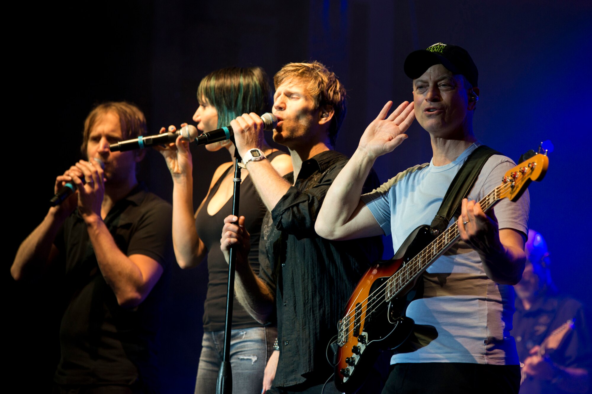 (L-R) Members of The Lt. Dan Band, Dan Myers, Molly Callinan, Jeff Vezain and Gary Sinise perform at Little Rock Air Force Base, Ark., April 29, 2016. The band, which is associated with the Sinise’s charity foundation and the United Service Organizations, perform more than 40 concerts for military members and their families each year. (U.S. Air Force photo by Master Sgt. Jeff Walston)   