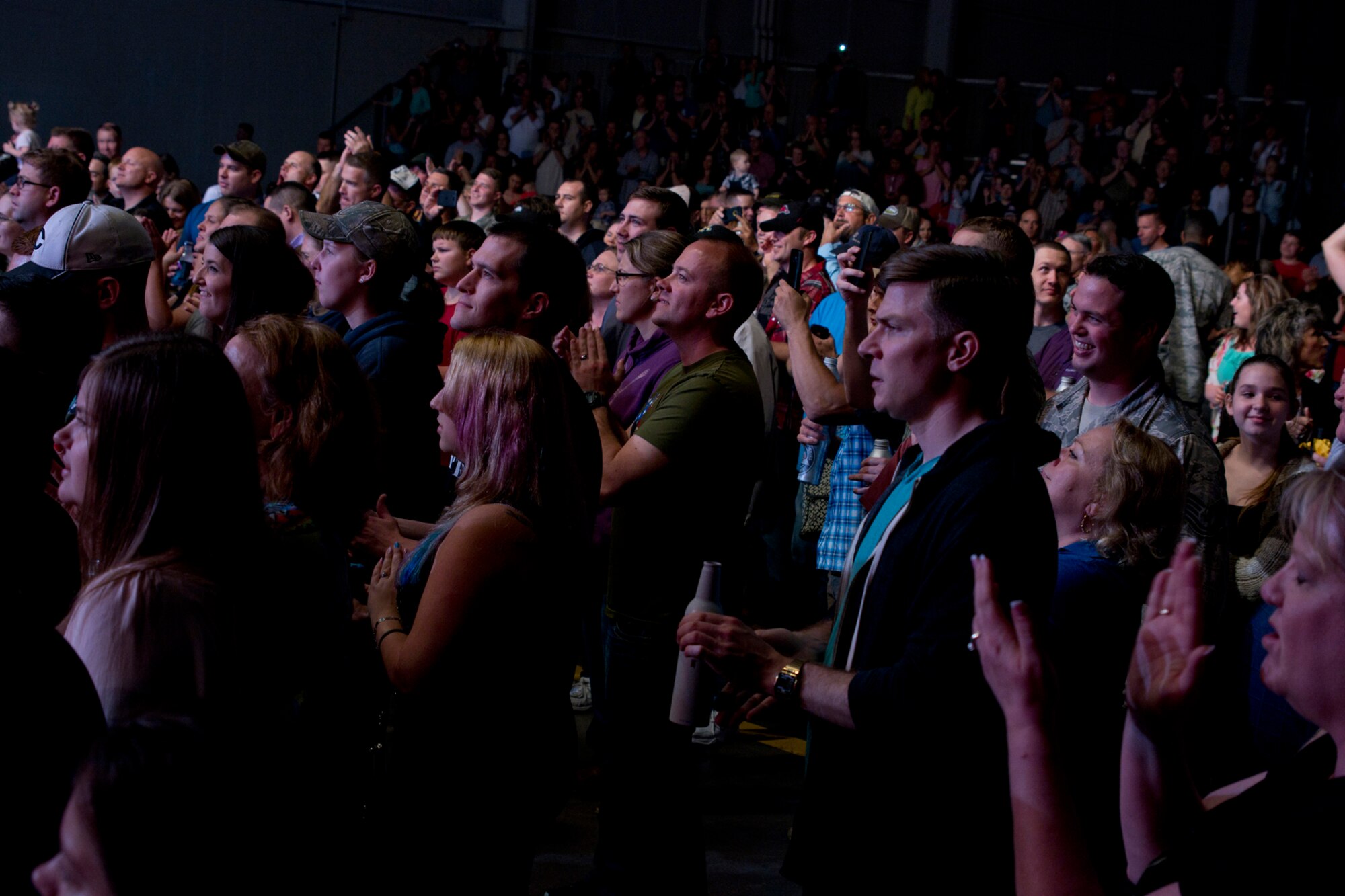 An enthusiastic crowd enjoys a Gary Sinise and The Lt. Dan Band performance at Little Rock Air Force Base, Ark., April 29, 2016. The band, which is associated with the Sinise's charity foundation and the United Service Organizations, perform more than 40 concerts for military members and their families each year. (Courtesy photo by Eva Walston)
