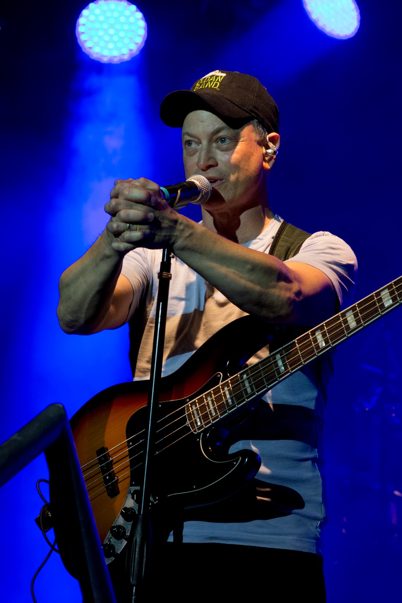 Gary Sinise talks about the importance of the military during a free concert at Little Rock Air Force Base, Ark., April 29, 2016. Sinise, an actor and musician, performed with the Lt. Dan Band at the base, as he has done hundreds of times, for thousands of military audiences around the world. The Lt Dan Band gets its name from the character Sinise portrayed in the Academy-Award winning movie “Forrest Gump.” (Courtesy photo by Eva Walston)