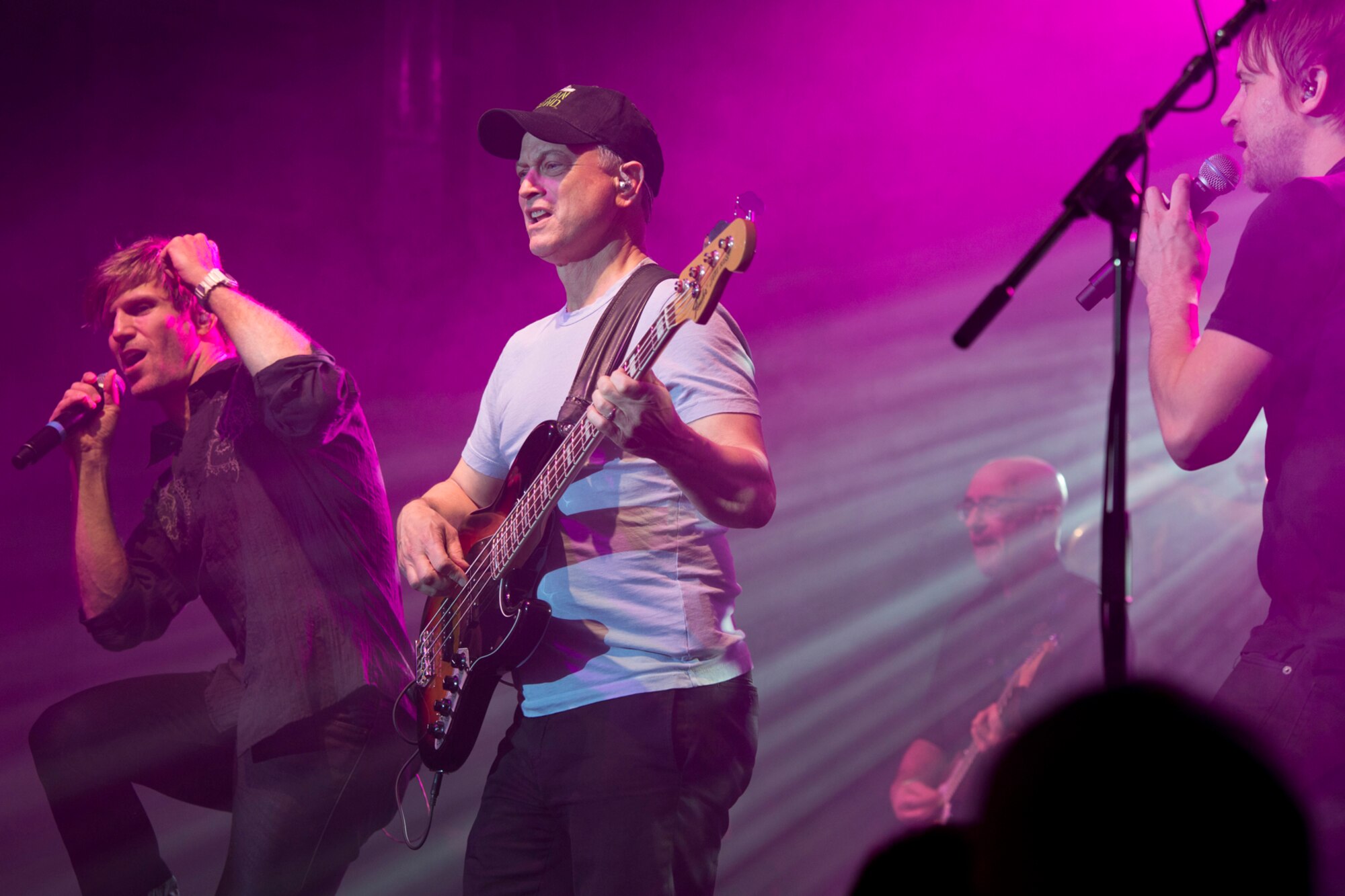 (L-R) Members of The Lt. Dan Band, Jeff Vezain, Gary Sinise and Dan Myers, perform at Little Rock Air Force Base, Ark., April 29, 2016. Sinise, an actor and musician, performed a free concert with the Lt. Dan Band at the base, as he has done hundreds of times, for thousands of military audiences around the world. The Lt. Dan Band gets its name from the character Sinise portrayed in the Academy-Award winning movie “Forrest Gump.” (U.S. Air Force photo by Master Sgt. Jeff Walston)   