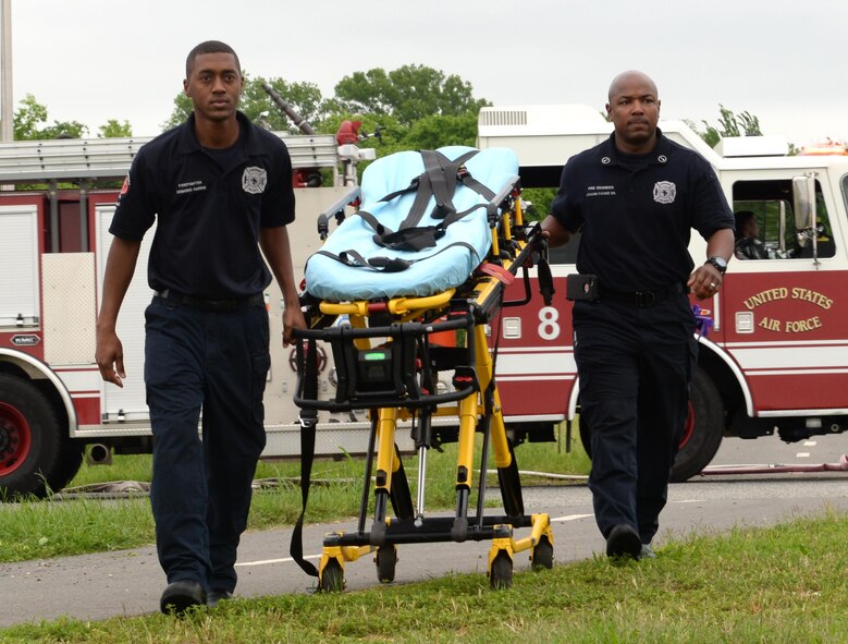 First responders arrive on scene at a simulated emergency at Barksdale Air Force Base, La., April 25, 2016. Practicing for emergency situations allows response agencies the opportunity to test readiness, evaluate emergency procedures, alleviate possible issues and, in the event something does occur, save lives. (U.S. Air Force photo/Airman 1st Class Curt Beach)