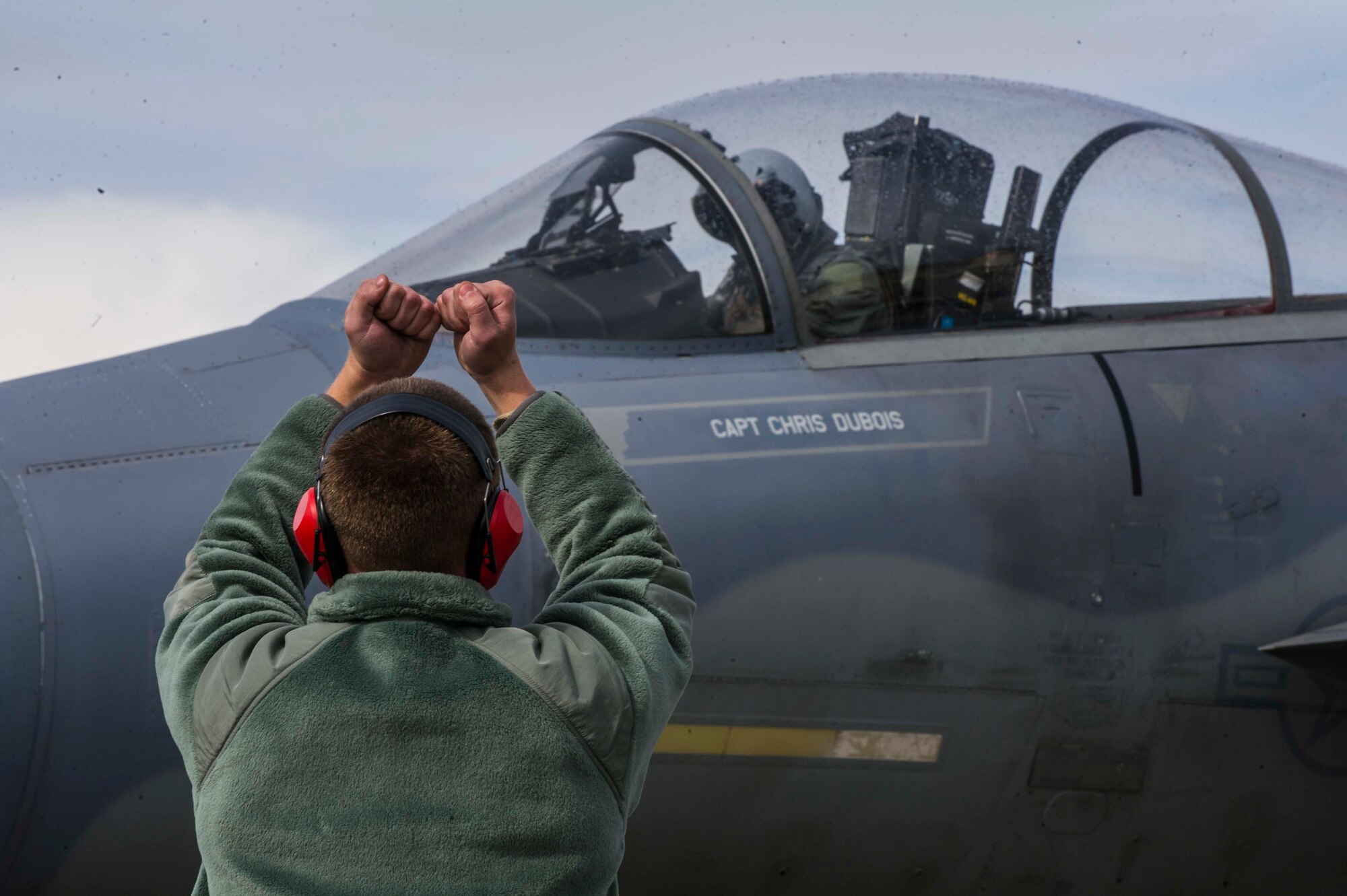 U.S. Air Force Senior Airman Dyllan Jones, a crew chief assigned to the 67th Aircraft Maintenance Unit, Kadena Air Base, Japan, prepares an F-15 Eagle tactical fighter jet prior to a launch at Eielson Air Force Base, Alaska, May 3, 2016, during RED FLAG-Alaska (RF-A) 16-1. RF-A is a series of Pacific Air Forces commander-directed field training exercises for U.S. and partner nation forces, providing combined offensive counter-air, interdiction, close air support and large force emplyment training in a simulated combat environment. (U.S. Air Force photo by Staff Sgt. Joshua Turner/Released)