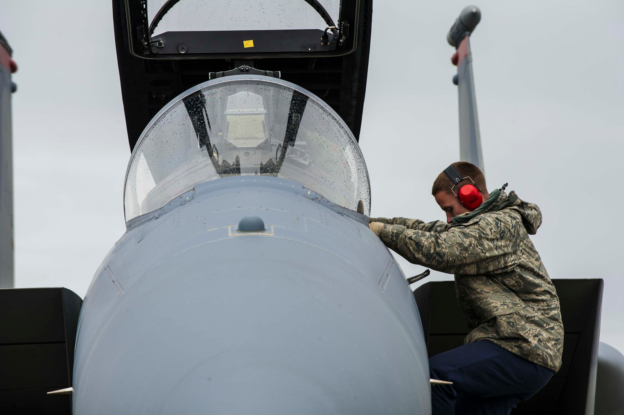 U.S. Air Force Senior Airman Dyllan Jones, a crew chief assigned to the 67th Aircraft Maintenance Unit, Kadena Air Base, Japan, prepares an F-15 Eagle tactical fighter jet prior to a launch at Eielson Air Force Base, Alaska, May 3, 2016, during RED FLAG-Alaska (RF-A) 16-1. RF-A is a series of Pacific Air Forces commander-directed field training exercises for U.S. and partner nation forces, providing combined offensive counter-air, interdiction, close air support and large force employment training in a simulated combat environment. (U.S. Air Force photo by Staff Sgt. Joshua Turner/Released)