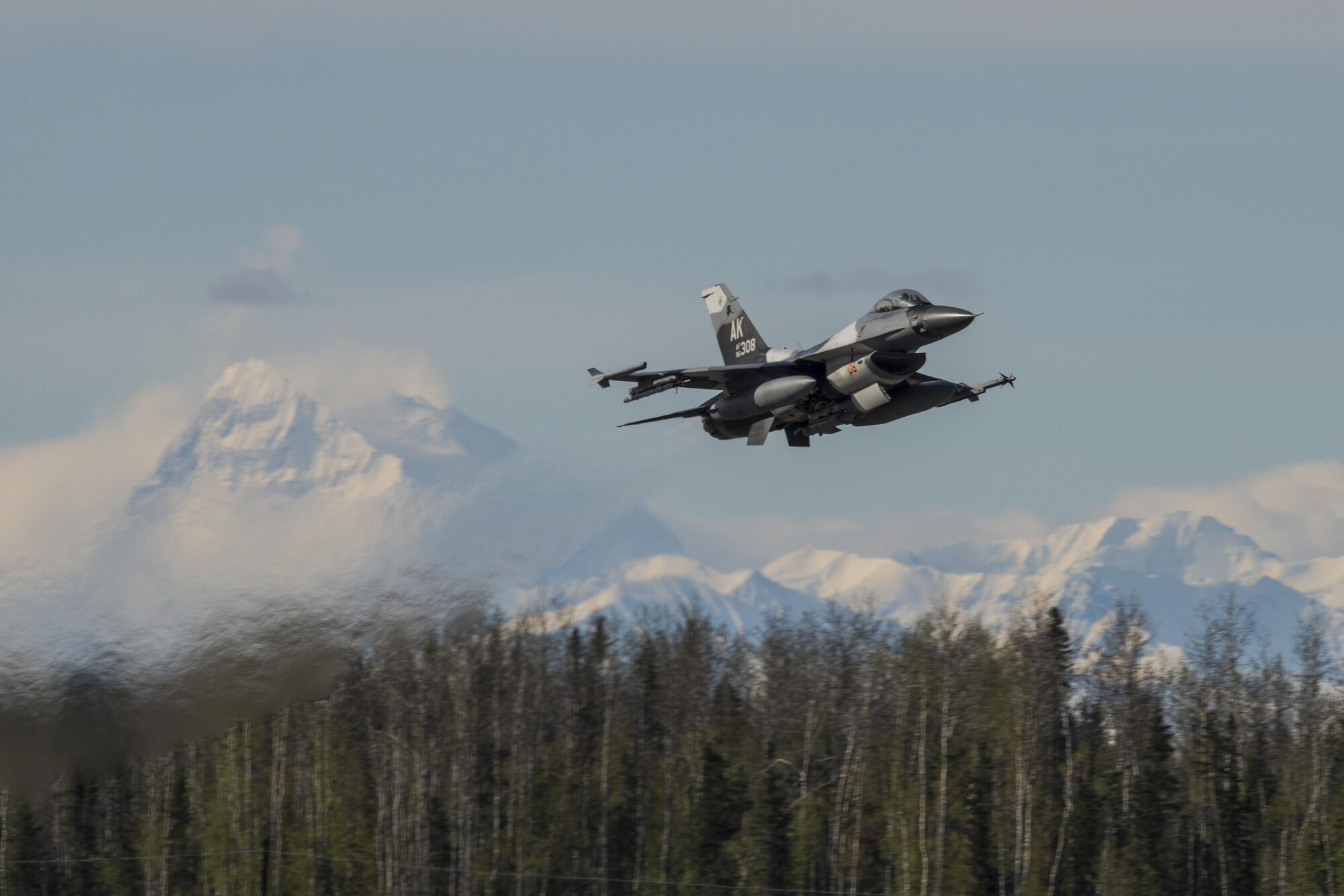 A U.S. Air Force F-16 Fighting Falcon assigned to the 18th Aggressor Squadron at Eielson Air Force Base, Alaska, May 4, 2016, takes off from the base during RED FLAG-Alaska (RF-A) 16-1. Aggressor pilots are trained to act as opposing forces in exercises like RF-A to better prepare U.S. and allied forces for aerial combat. (U.S. Air Force photo by Staff Sgt. Joshua Turner/Released)