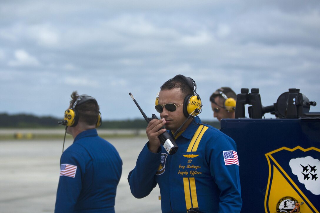 Navy Lt. Greg Bollinger talks to pilots on his radio before participating in the 2016 Cherry Point Air Show “Celebrating 75 Years,” at Marine Corps Air Station Cherry Point, N.C., April 29, 2016. Bollinger is a supply officer assigned to the Navy's flight demonstration squadron, the Blue Angels. Marine Corps photo by Cpl. Jodson B. Graves
