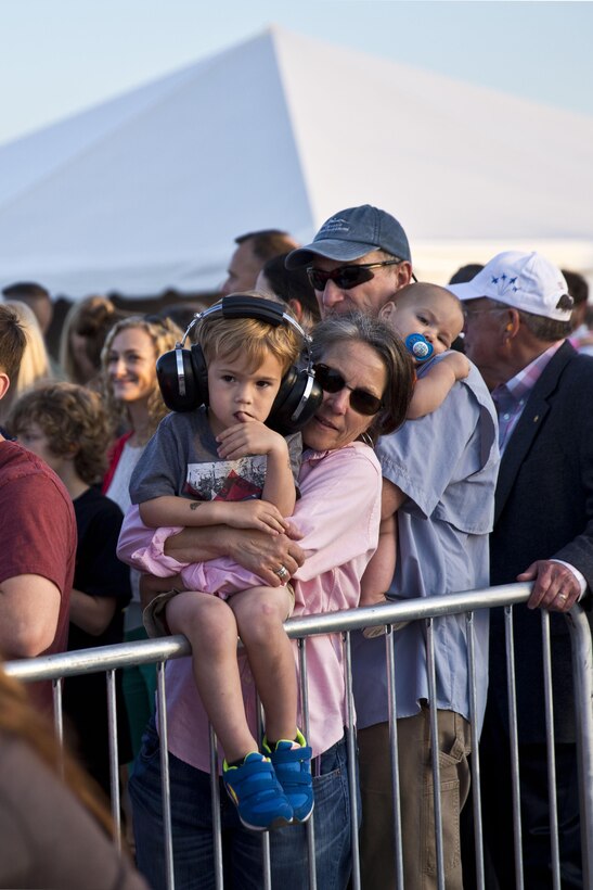 Spectators watch the Navy's flight demonstration squadron, the Blue Angels, perform a variety of formations during the 2016 Cherry Point Air Show “Celebrating 75 Years,” at Marine Corps Air Station Cherry Point, N.C., April 29, 2016. Marine Corps photo by Cpl. Jodson B. Graves