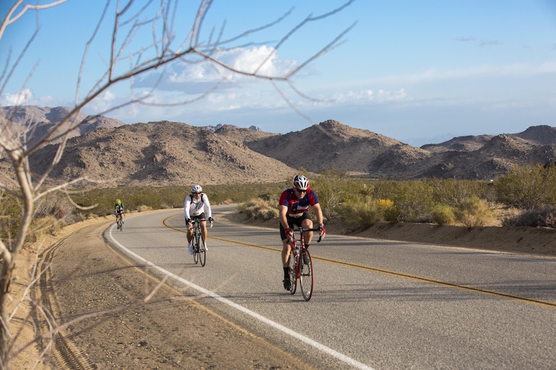 Cyclists complete a 50-mile ride during the Park-to-Park Bike Ride through Joshua Tree National Park, Calif., April 30, 2016. The event was hosted as a joint effort between the Combat Center, the City of Twentynine Palms and the Joshua Tree National Park Service to celebrate Earth Day as well as the 100-year anniversary of the park. (Official Marine Corps photo by Lance Cpl. Levi Schultz/Released)