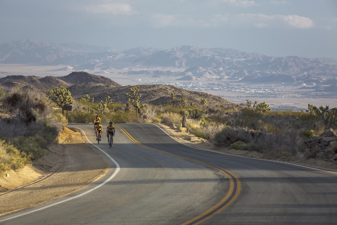 Cyclists complete a 50-mile ride during the Park-to-Park Bike Ride through Joshua Tree National Park, Calif., April 30, 2016. The event was hosted as a joint effort between the Combat Center, the City of Twentynine Palms and the Joshua Tree National Park Service to celebrate Earth Day as well as the 100-year anniversary of the park. (Official Marine Corps photo by Lance Cpl. Levi Schultz/Released)
