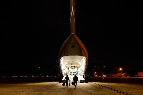 Vickie McCall, left, and Dr. Joe Leverett board a C-17 Globemaster III at Joint Base Andrews, Md., April 17, 2016, to start their weeklong civic leader trip to several bases in Europe. Air Force civic leaders are unpaid advisers, key communicators and advocates for the Air Force. (U.S. Air Force photo/Tech. Sgt. Joshua DeMotts)