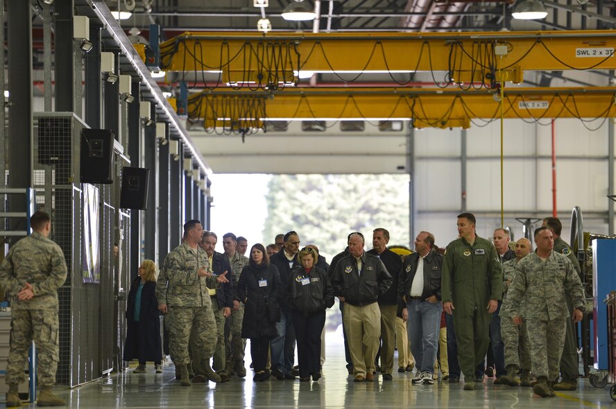 A group of Air Force civic leaders visit the prop shop at Royal Air Force Lakenheath, England, April 19, 2016, during a weeklong civic leader trip to several bases in Europe. Air Force civic leaders are unpaid advisers, key communicators and advocates for the Air Force. (U.S. Air Force photo/Tech. Sgt. Joshua DeMotts)