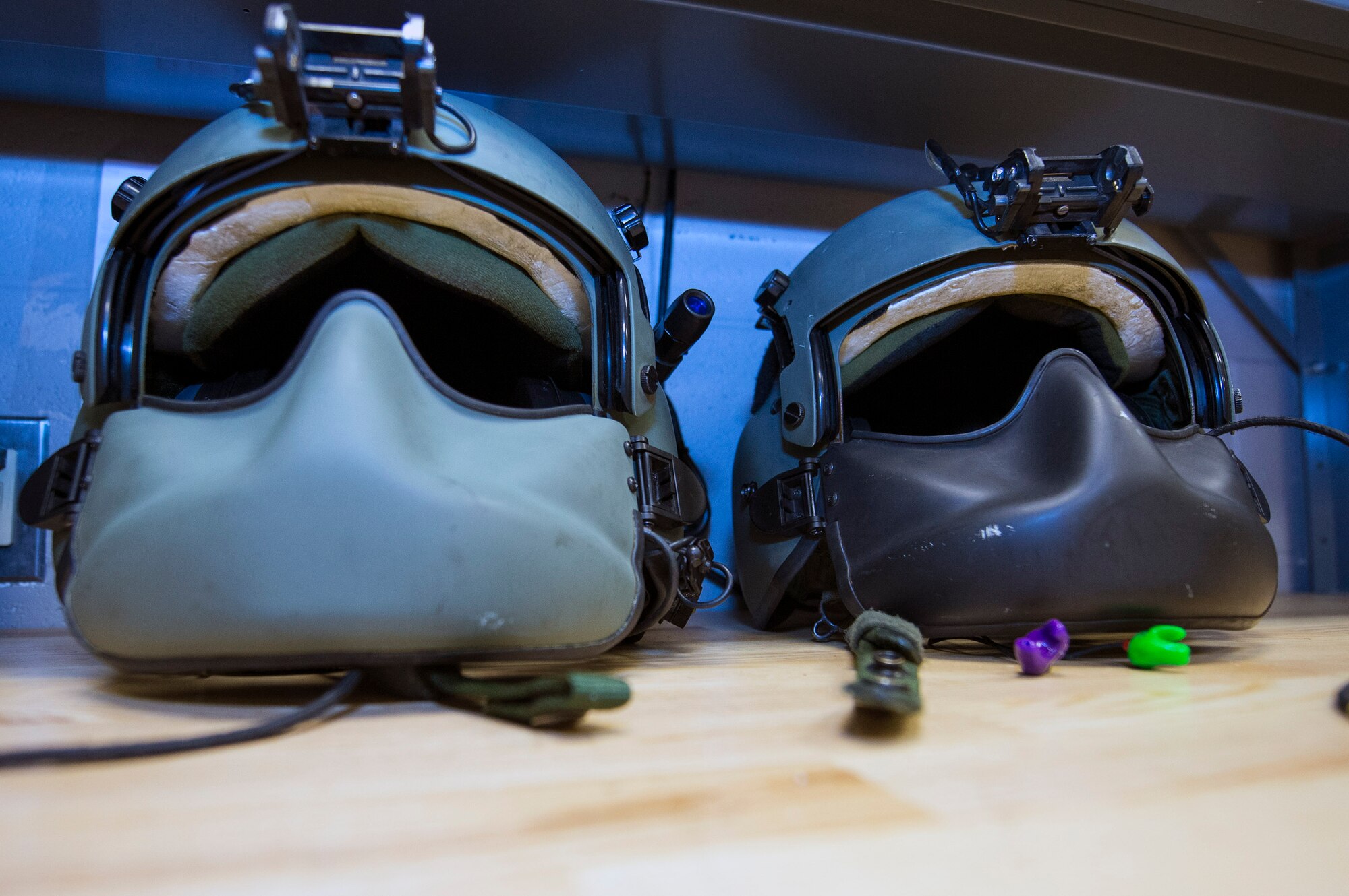 HGU-56P flight helmets rest on a table after an inspection, May 5, 2016, at Moody Air Force Base, Ga. The helmet is equipped with features that enhance aircrew personnel’s fitting, functionality, mission adaptability and includes vital head protection during flight. (U.S. Air Force photo by Airman 1st Class Greg Nash/Released) 