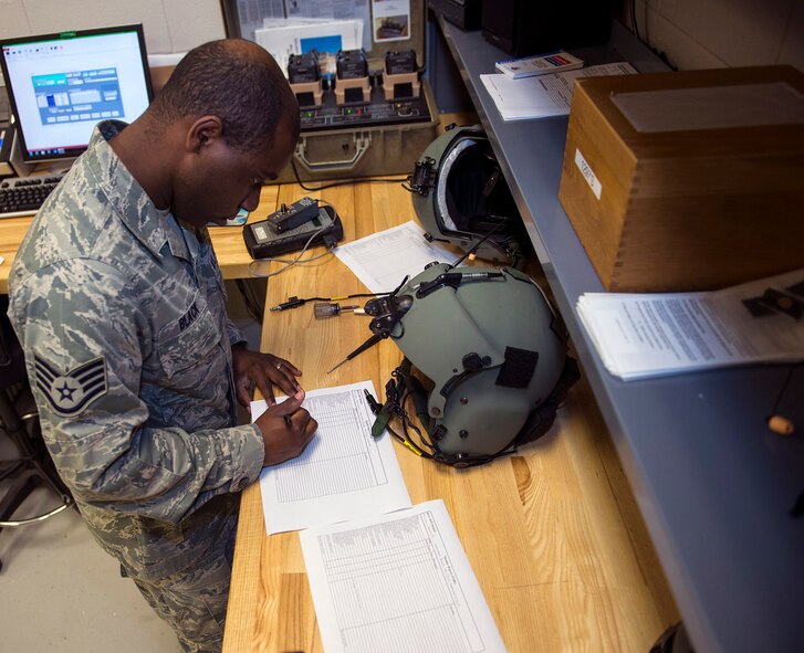 U.S. Air Force Staff Sgt. Mitchel Black, 347th Operations Support Squadron aircrew flight equipment assistant NCO in charge, conducts a quality assurance inspection on an HGU-56P flight helmet. The inspection consists of checking 30 aspects of the helmets configuration such as the energy absorbent liner and earphone motors. (U.S. Air Force photo by Airman 1st Class Greg Nash/Released)  