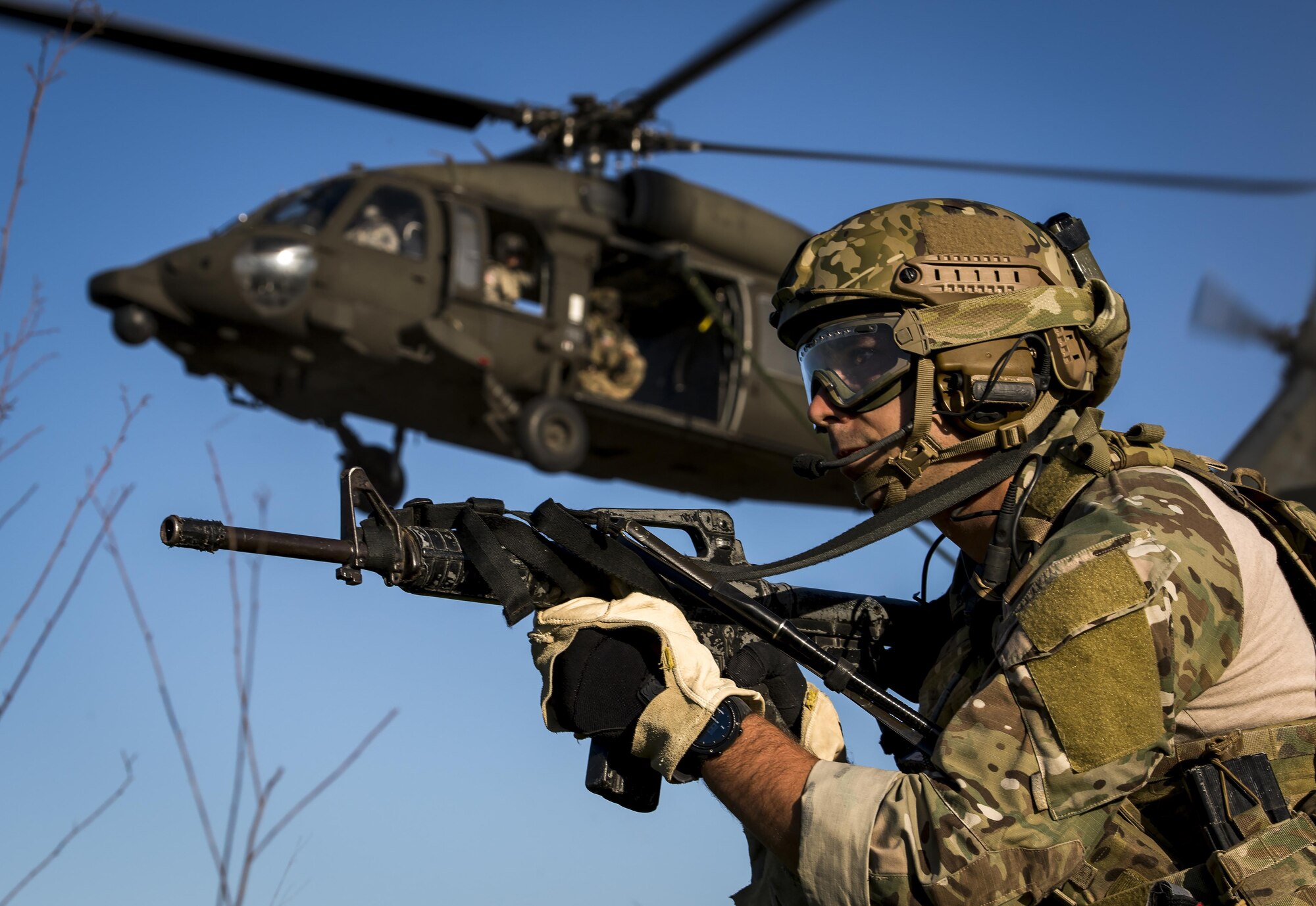 Special Tactics Training Squadron Airmen from the 24th Special Operations Wing fast rope from a U.S. Army UH-60 Black Hawk at Hurlburt Field, Fla., May 4, 2016, during Emerald Warrior 16. Emerald Warrior is a U.S. Special Operations Command sponsored mission rehearsal exercise during which joint special operations forces train to respond to real and emerging worldwide threats. (U.S. Air Force photo by Senior Airman Trevor T. McBride)                     