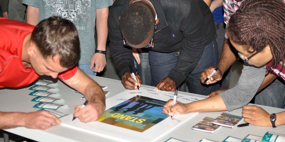 The first Denim Day event at Marine Corps Air Facility was concluded with the signing of a Sexual Assault Awareness poster on April 22.