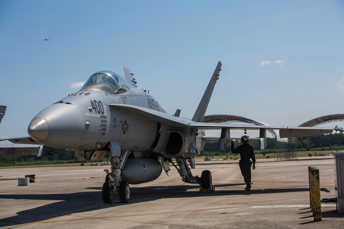 A Marine performs a pre-flight inspection on an F/A-18C Hornet aboard Marine Corps Air Station Beaufort May 3. Marine Fighter Attack Squadron 251 will be participating in a weapons systems Evaluation Program at Tyndall Air Force Base, Fla. May 6-20. The Marine is with VMFA-251.
