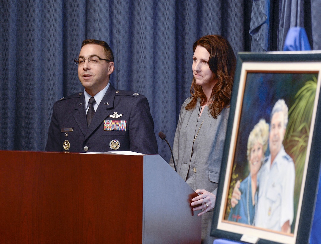 Col. William Liquori Jr. and his wife, Amy, speak after they are presented the 2015 General and Mrs. Jerome F. O' Malley Award during a Pentagon ceremony May 3, 2016. The award was earned during the Liquoris’ time leading the 50th Space Wing at Schriever Air Force Base, Colo. (U.S. Air Force photo/Andy Morataya)