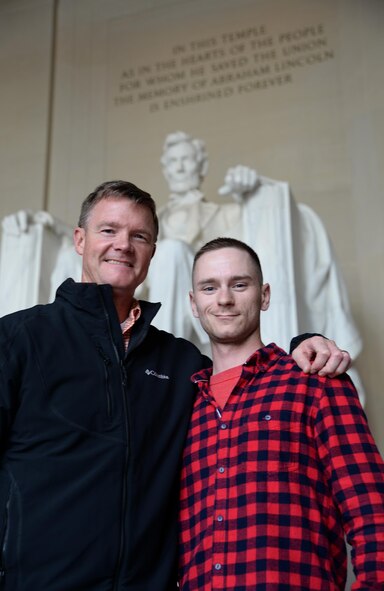 Staff Sgt. Cody Sparks, right, Air Education and Training Command Airman of the Year, poses with Col. Thomas Shank, left, 47th Flying Training Wing commander, in front of the Lincoln Memorial April 11, 2016. During a visit to Capitol Hill to inform congressional leadership about Laughlin Air Force Base, Sparks toured memorials learning about Air Force heritage from his wing commander.