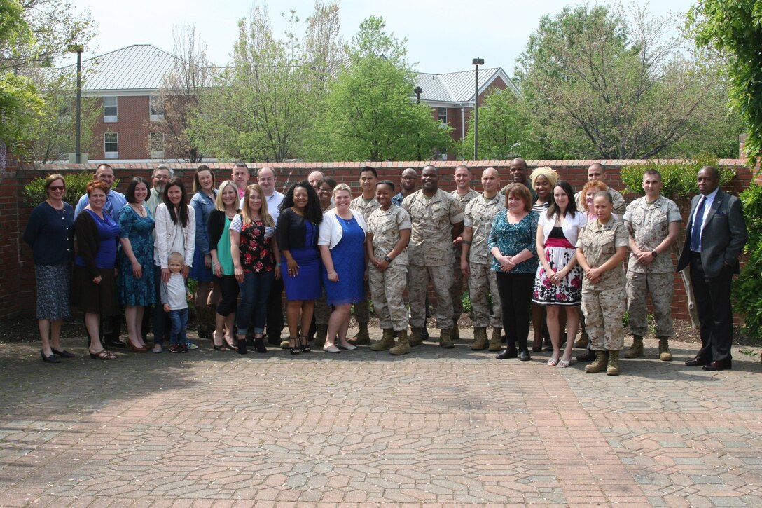 Marines and civilian employees posted to Marine Corps Base Quantico gather at The Clubs at Quantico for a Volunteer Appreciation Luncheon April 21. More than 60 volunteers (out of 700 registered) were recognized for their efforts on behalf of the community surrounding the base.