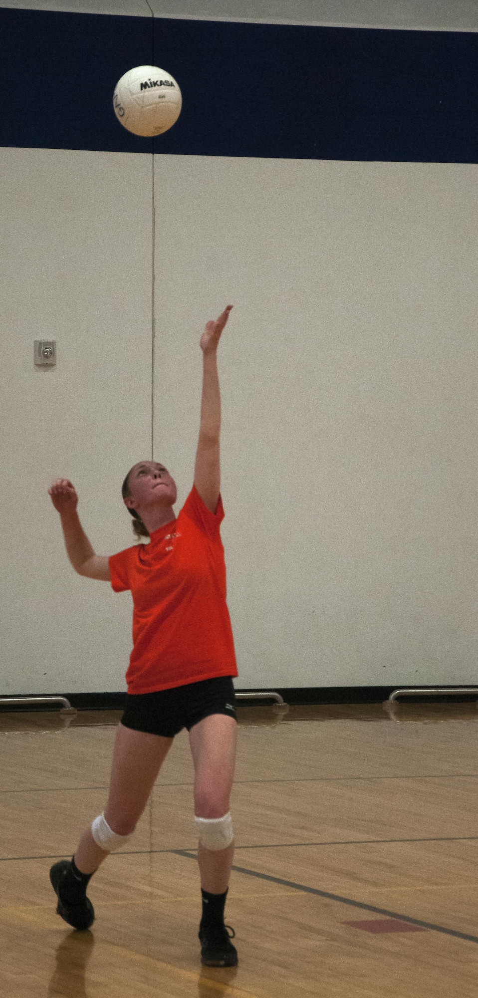 Carissa Wiliams, 90th Medical Group intramural volleyball team member, prepares to serve the volleyball during a championship match May, 4, 2016, inside the Freedom Hall Fitness Center on F.E. Warren Air Force Base, Wyo. The MDG team played hard, but lost the final match of the championship game. (U.S. Air Force photo by Senior Airman Brandon Valle)