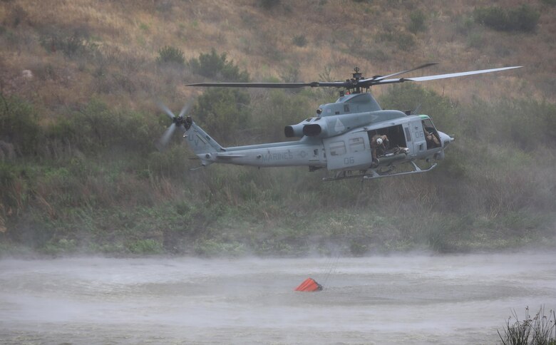 Camp Pendleton hosts the Wildland Firefighting Exercise 2016 at Las Pulgas Lake, May 5. The Wildland Firefighting Exercise 2016 combines elements of aviation and ground units from Camp Pendleton, 3rd Marine Air Wing, Navy Region Southwest, The California Department of Forestry and Fire Protection, and the San Diego's Sheriff's Department. (Marine Corps photo by Lance Cpl. Emmanuel Necoechea/RELEASED)
