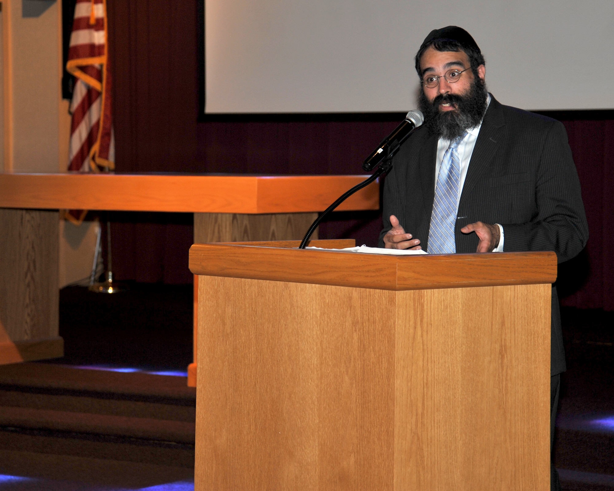 Rabbi Yisroel Hahn speaks with Airmen during a Holocaust Remembrance Day event May 4, 2016 at Fairchild Air Force Base, Wash. Hahn was invited to guest speak at the event to provide Airmen with insight and history of the Holocaust. Members of Team Fairchild gathered at the chapel to remember and honor those who suffered and died during the Holocaust. (U.S. Air Force photo/ Staff Sgt. Samantha Krolikowski)

