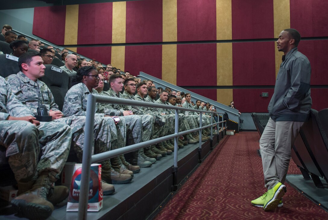 Anthony Mackie, actor, address U.S. Airmen at a movie theater in Hampton Va., May 4, 2016. Mackie surprised the Airmen with a pre-screening of the upcoming Marvel movie, Captain America: Civil War. (U.S. Air Force photo by Senior Airman Kayla Newman)